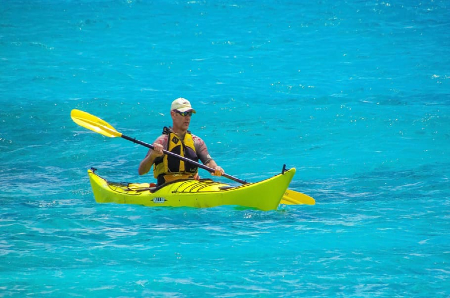 Man in a kayak on the ocean